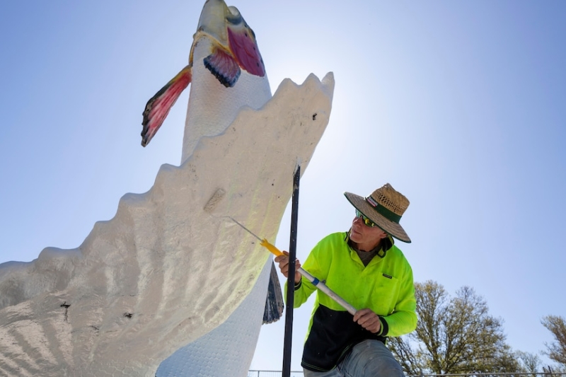 Adaminaby's Big Trout is restored to its former glory after local outcry over first 'hideous' revamp last year