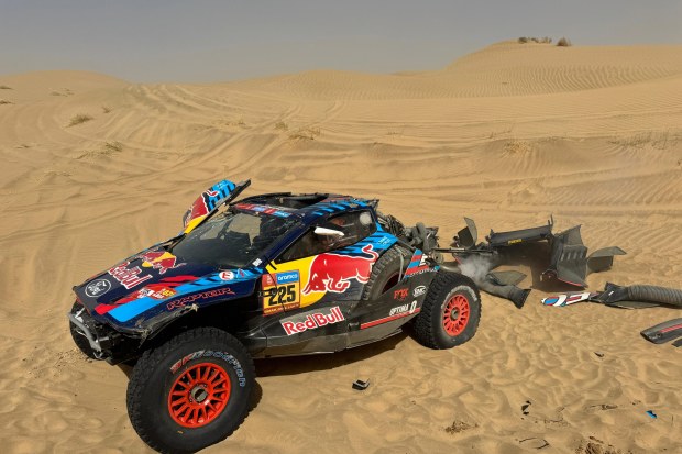 F1 star Carlos Sainz's dad rescued by teammate after wild flip in gruelling Dakar Rally