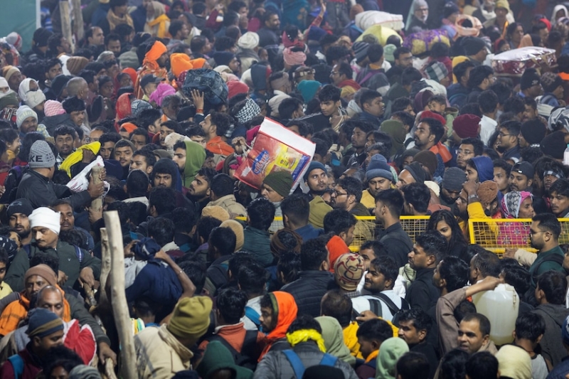 Bodies, clothes, bags lie on ground after deadly stampede at mass Hindu gathering in India