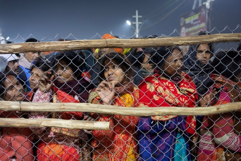 Bodies, clothes, bags lie on ground after deadly stampede at mass Hindu gathering in India