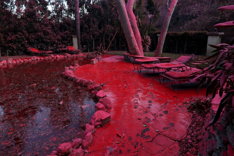 Los Angeles firefighters brace for return of Santa Ana winds as city bathed in hot pink flame retardant