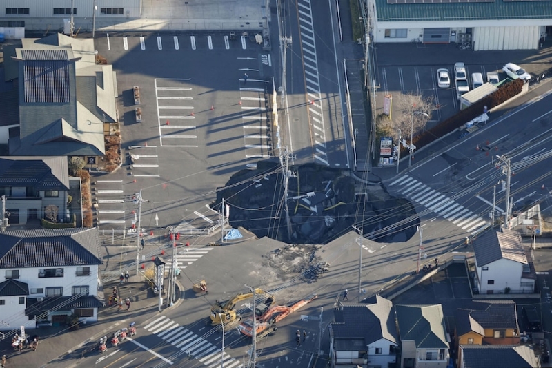 Rescue of elderly man trapped inside Japanese sinkhole enters third night