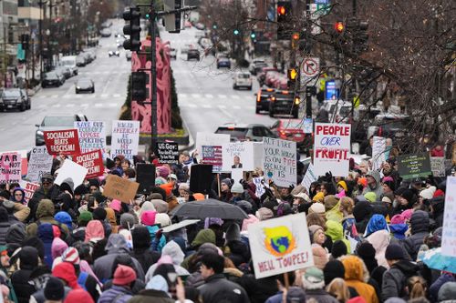 Thousands march in Washington days before Trump takes office