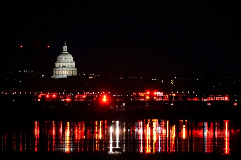 US plane crash live: Search continues in freezing conditions after jet and helicopter collide above Washington DC