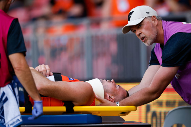 GWS star Kieren Briggs taken to hospital with possible neck injury after 'nasty' marking clash