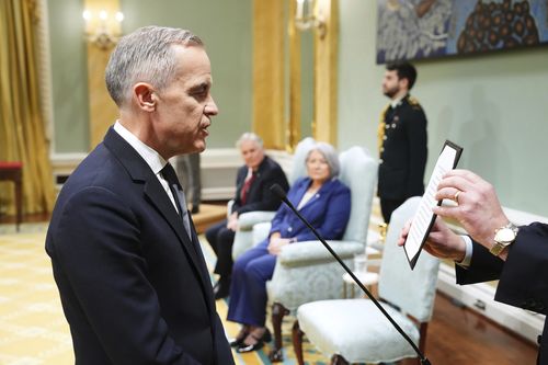 Mark Carney is sworn in as Canada's new prime minister as country deals with Trump's trade war