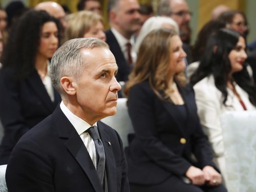 Mark Carney is sworn in as Canada's new prime minister as country deals with Trump's trade war