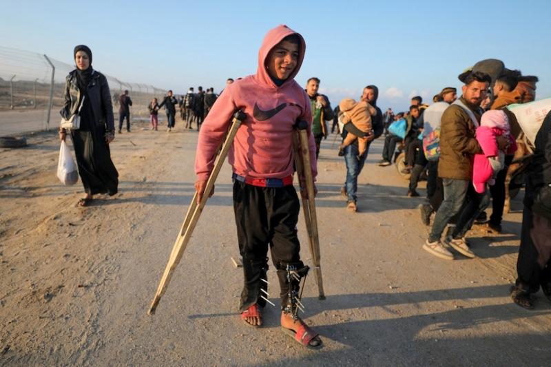 In pictures: Emotional scenes as Palestinians head home to northern Gaza amid ceasefire