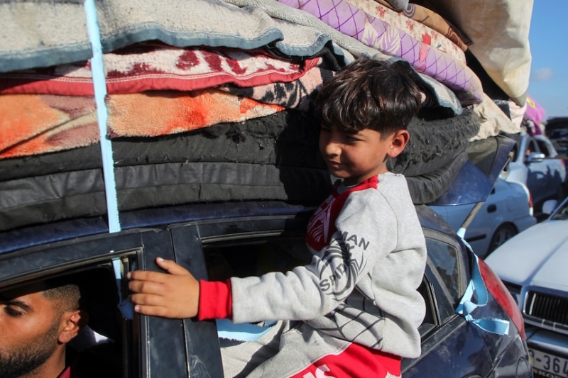 In pictures: Emotional scenes as Palestinians head home to northern Gaza amid ceasefire