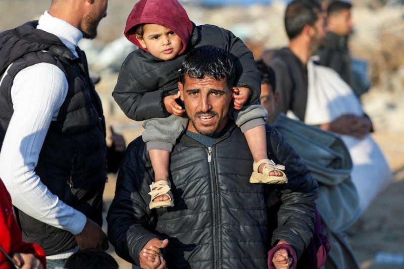 In pictures: Emotional scenes as Palestinians head home to northern Gaza amid ceasefire